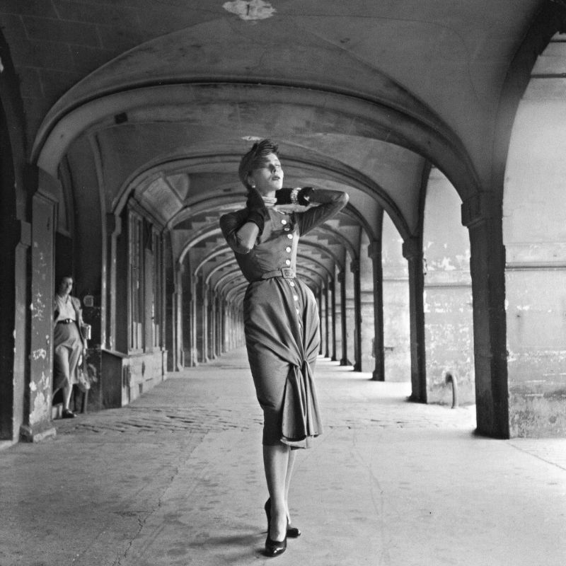 Bettina in day dress by Jacques Fath, Place des Vosges, Paris, 1950