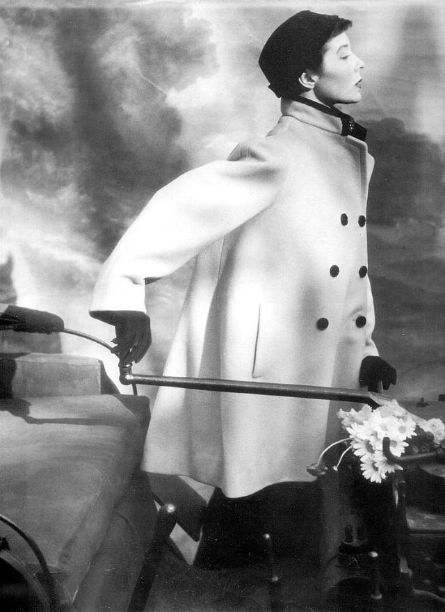 Bettina is wearing coat designed by Balenciaga, 1950
