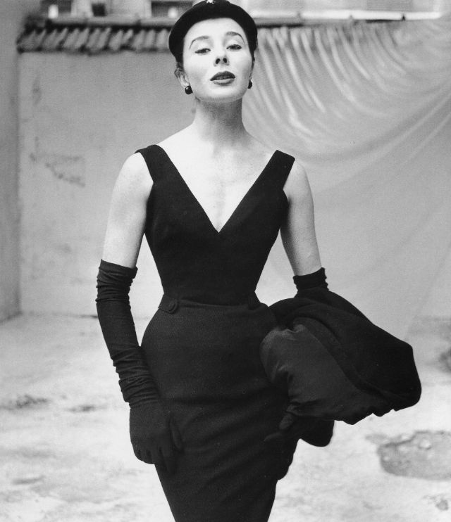 Bettina in Dior's simple but elegant dinner dress, 1952