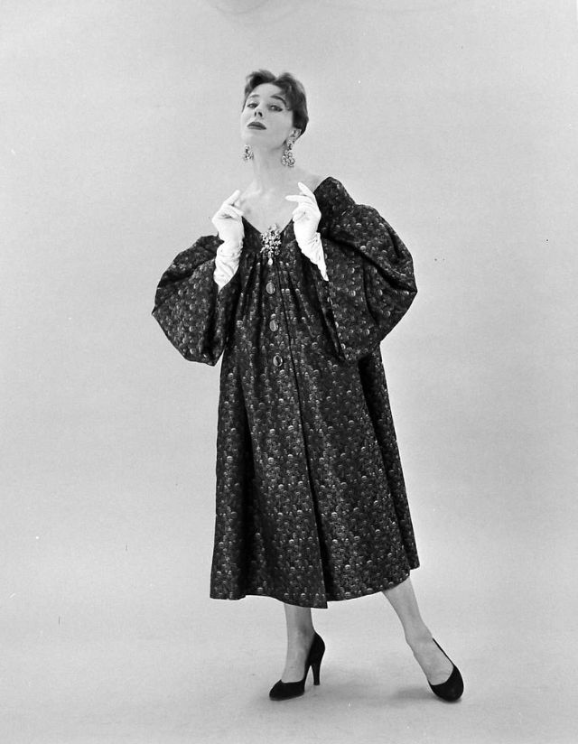 Bettina in Givenchy's smock-style off-shoulder dress, February 1952