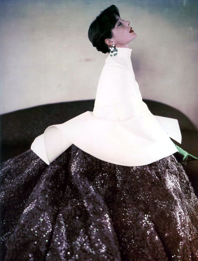 Bettina in sequined and beaded gown with white capelet by Givenchy, 1952
