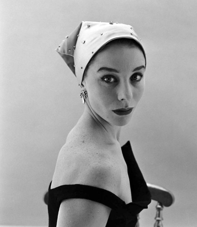 Bettina is wearing headscarf covered with paillettes by Givenchy, February 1952