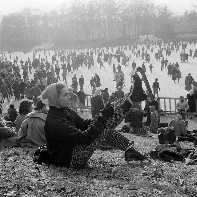 Tessa Beaumont, dancer from Les Ballets Roland Petit, putting on her skates.