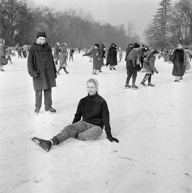Tessa Beaumont, dancer from Les Ballets Roland Petit, sitting on the ice.