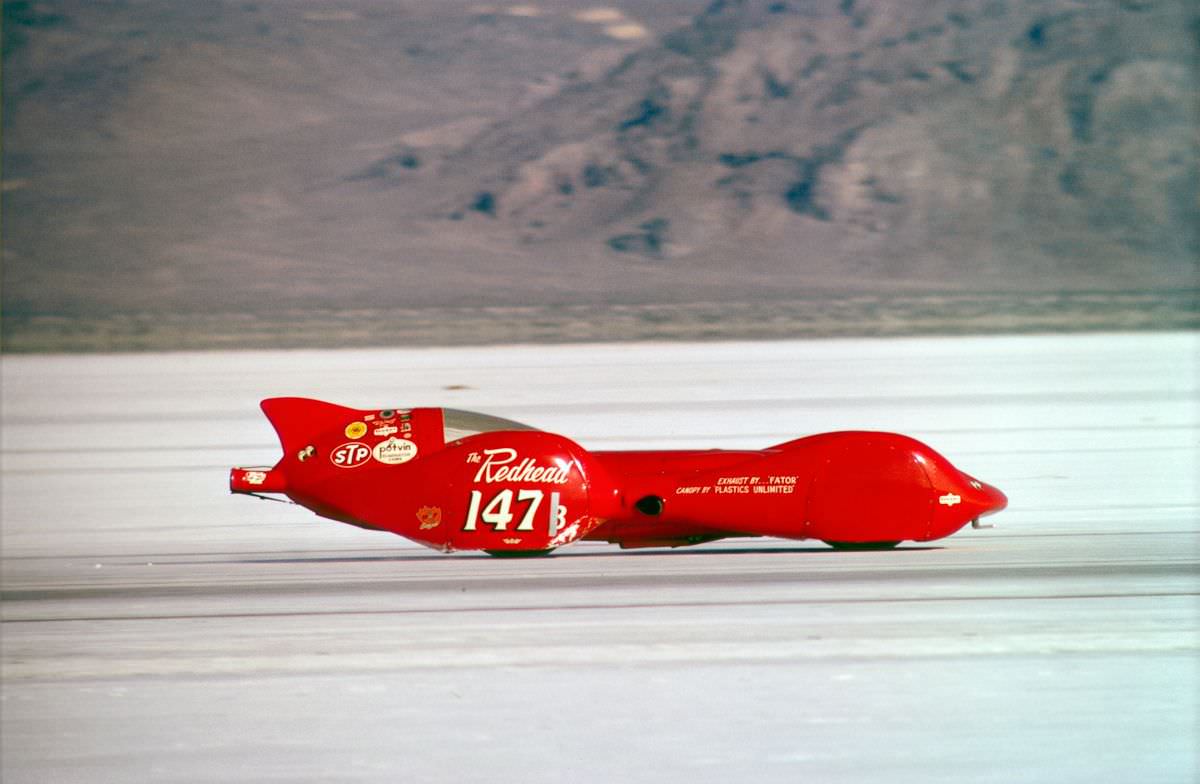 The Hammon-McGrath-Appenfels “Redhead” streamliner #147B wins the class trophy with a speed of 331.46 miles per hour.
