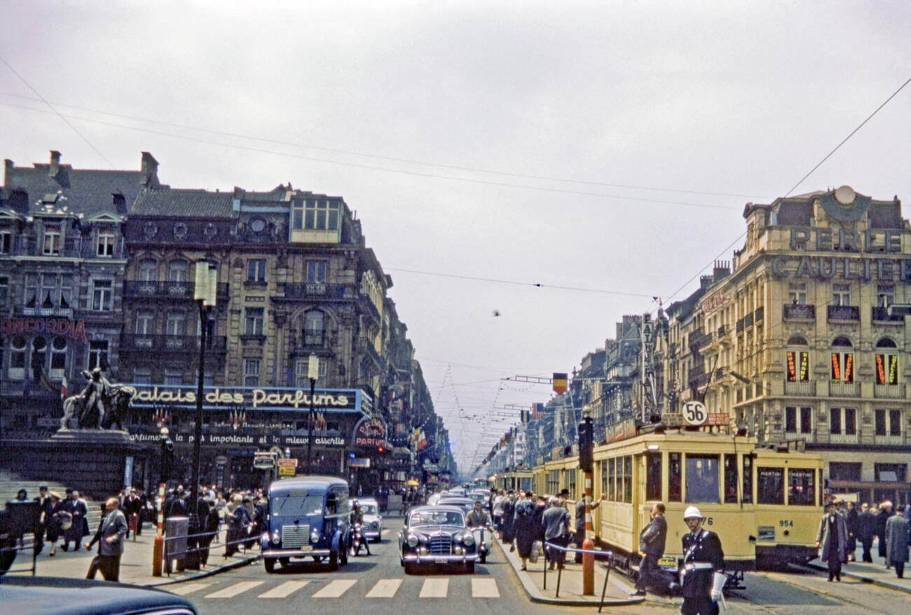 Looking down a busy Boulevard Anspach at Place de Bourse, Brussels, Belgium 1958.