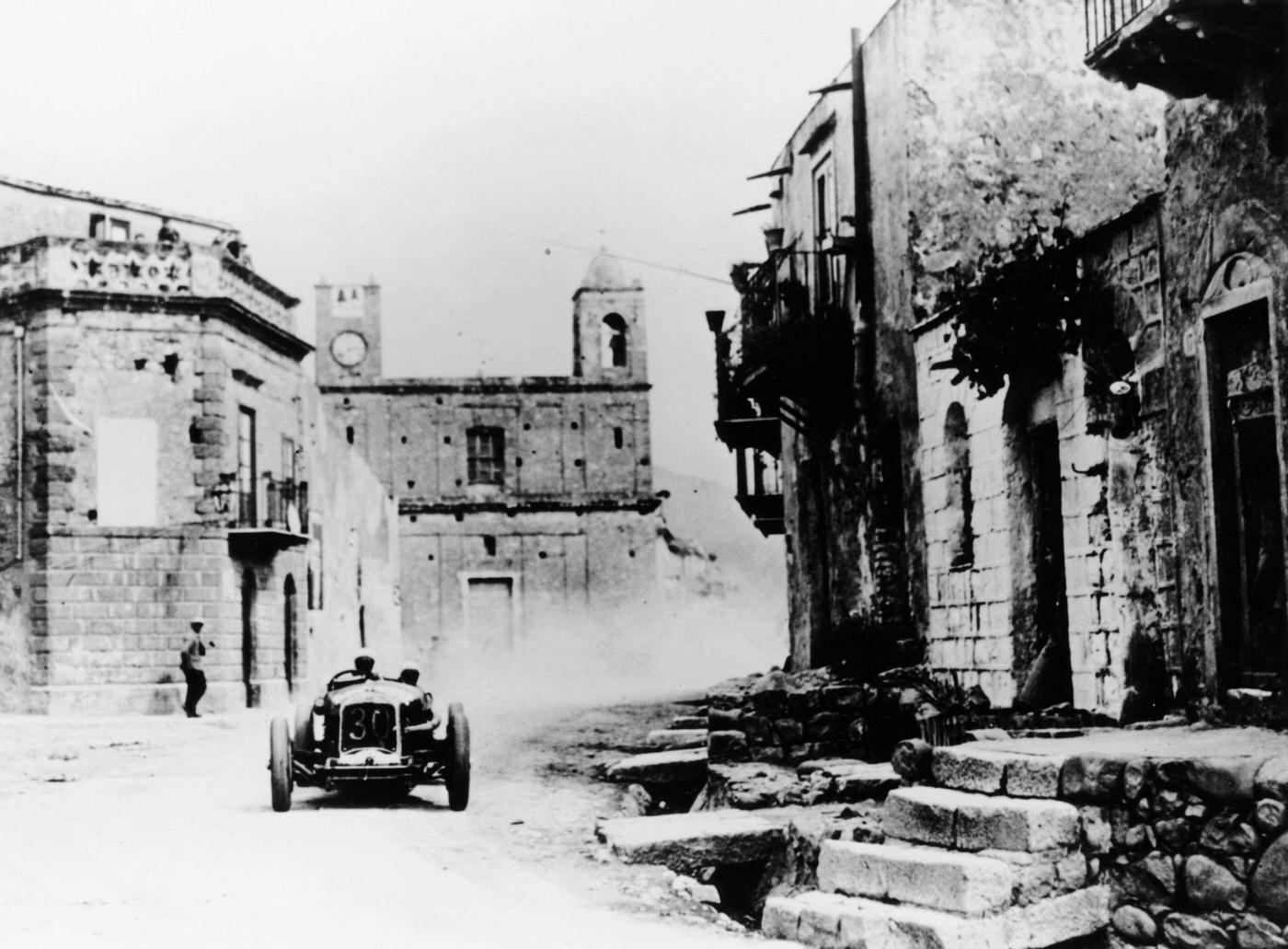 Achille Varzi in a P2 Alfa Romeo Grand Prix car, in the Targa Florio race, Sicily, 1930.