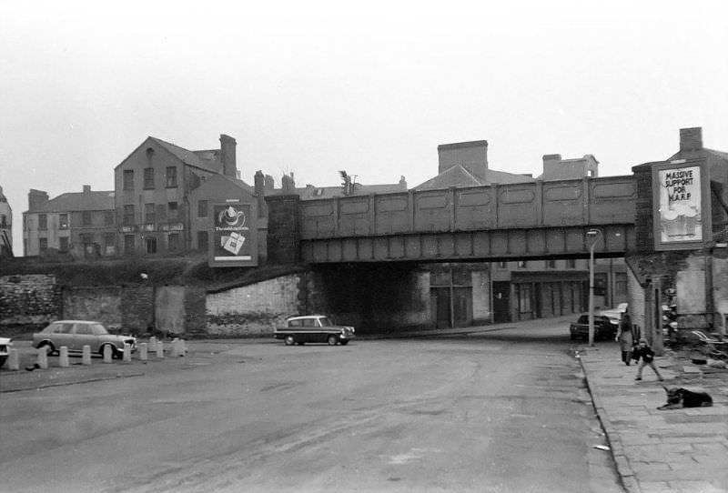 This view looking west of the bridge taking the line down to Cardiff Bay Station has changed beyond recognition! All the buildings in this view have gone. This is now the Junction between Lloyd George Ave and Herbert St, March 1974