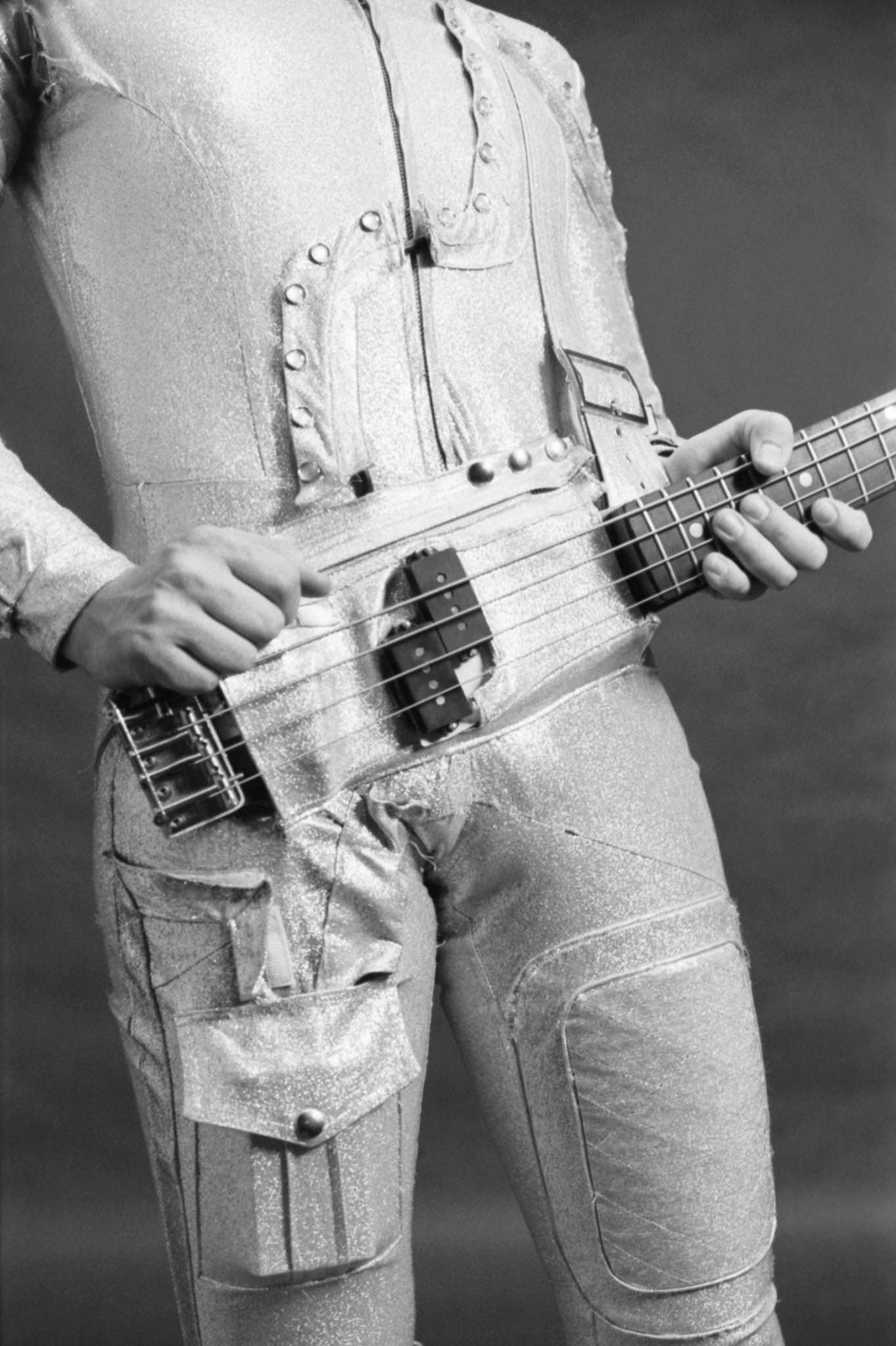 Dan Hartman wearing the Sound and holding a guitar