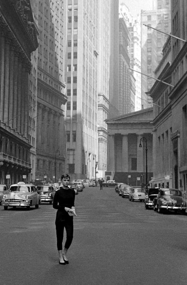 Audrey near Wall St. during filming of 'Sabrina', photo by Dennis Stock, 1954