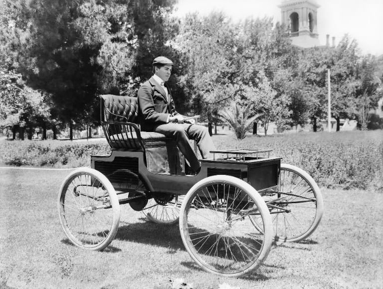 An old electric car, perhaps an old Baker Electric or Studebaker Electric, Los Angeles, California, 1900s