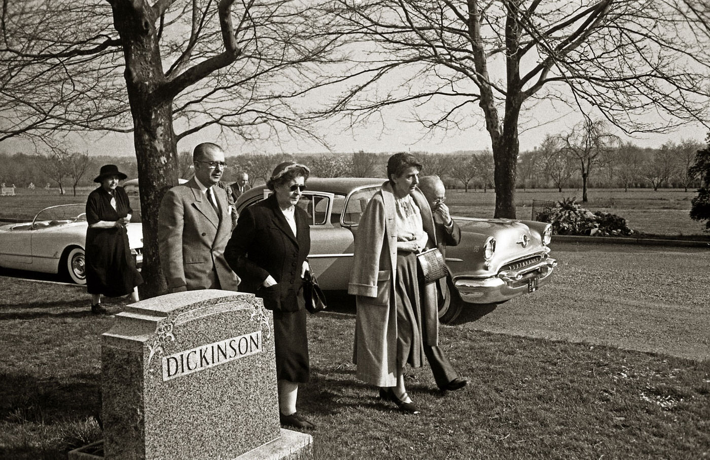On April 18, 1955, family and friends of Albert Einstein, including his son Hans Albert, his longtime secretary Helen Dukas, and his friend Dr. Gustav Bucky, gather at the Ewing Crematorium in Trenton, New Jersey, for his funeral service. An unidentified woman also joins them.