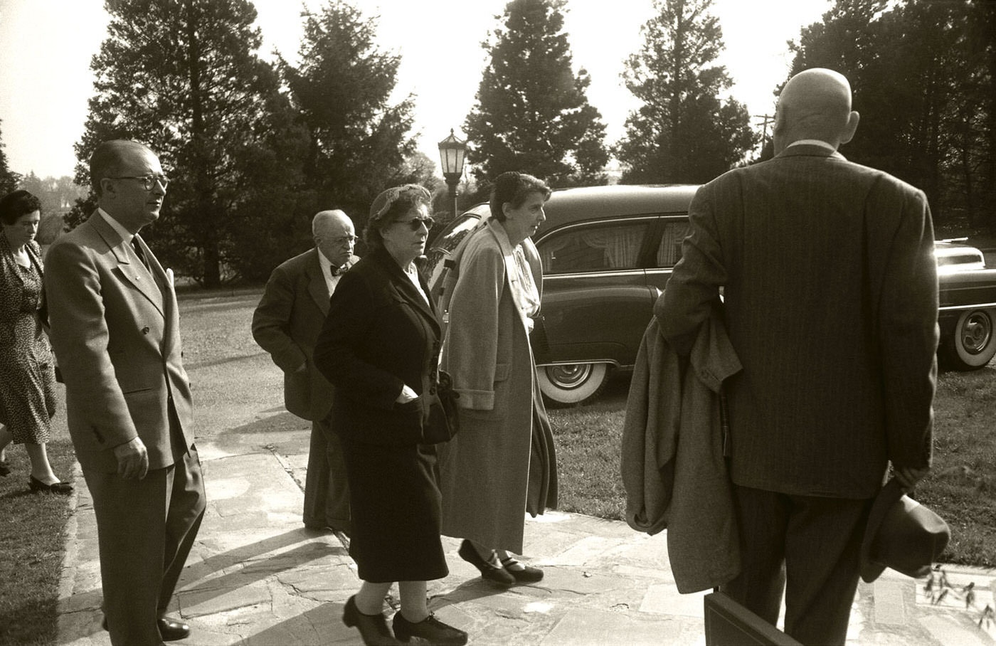 Mourners pay their respects to Albert Einstein as they enter the service while his casket rests nearby in Princeton in April 1955.