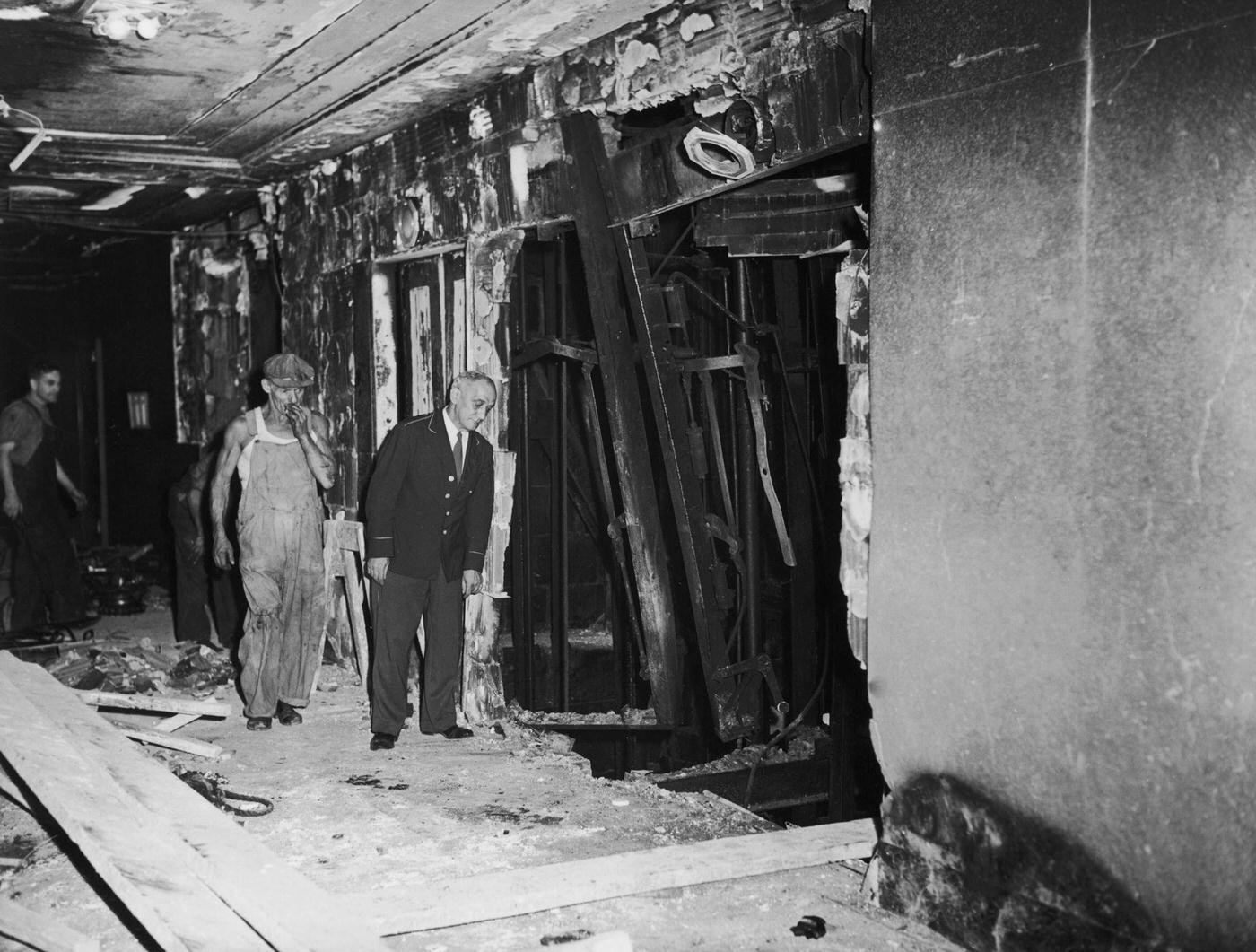 Exposed lift shafts on a damaged floor of the Empire State Building, after a B-25 Mitchell bomber crashed into the north side of the skyscraper, 1945