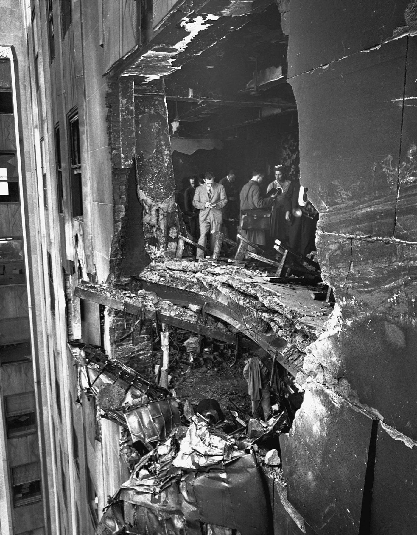 A view of the hole rammed into the 78th and 79th stories of the Empire State Building by a U.S. Army Bomber flying in the fog.