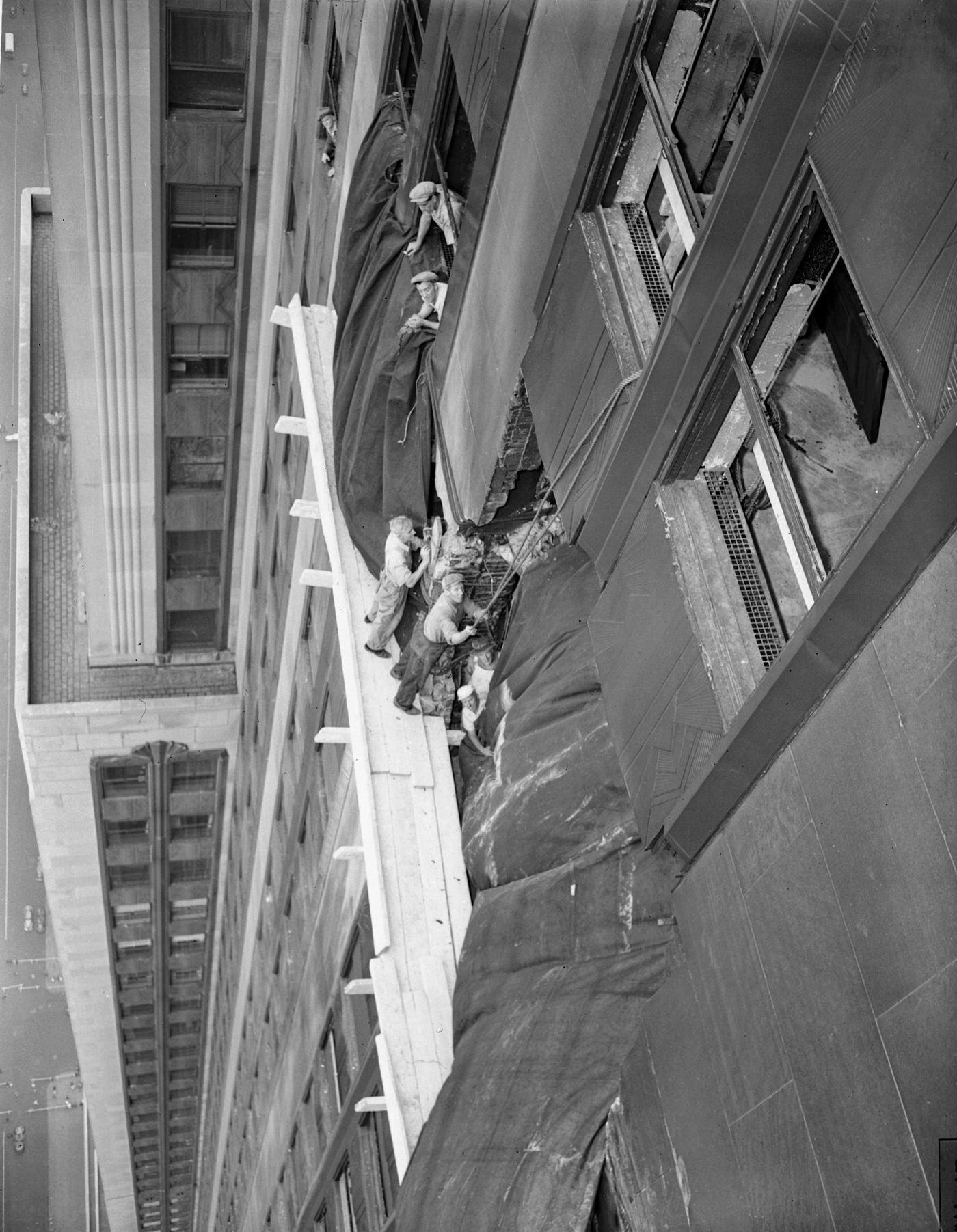 Workers on Side of Empire State Building