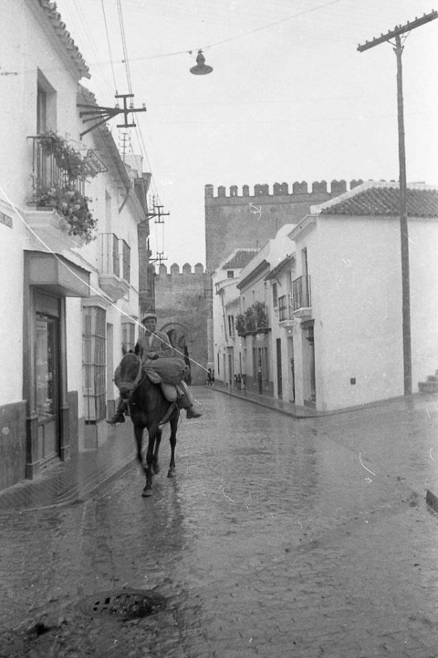 Spain. Gate in Carmona, 1950