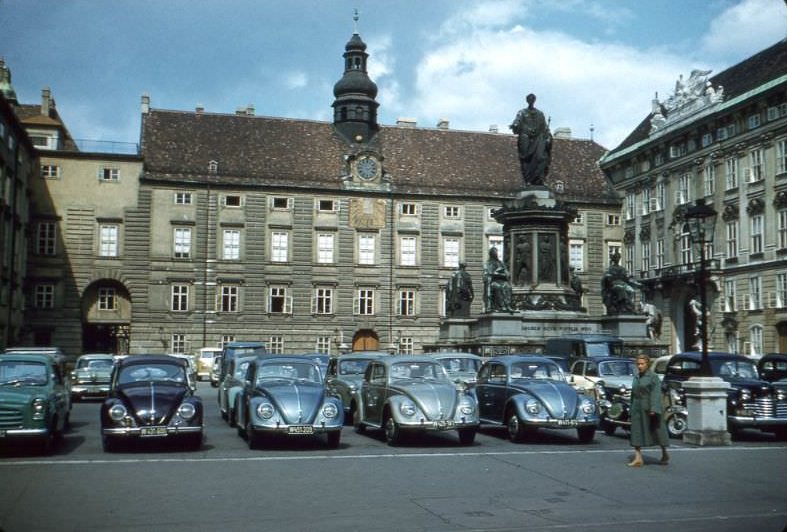 Hofburg palace with statue of Francis II and VW beetles, Vienna, Austria, 1958