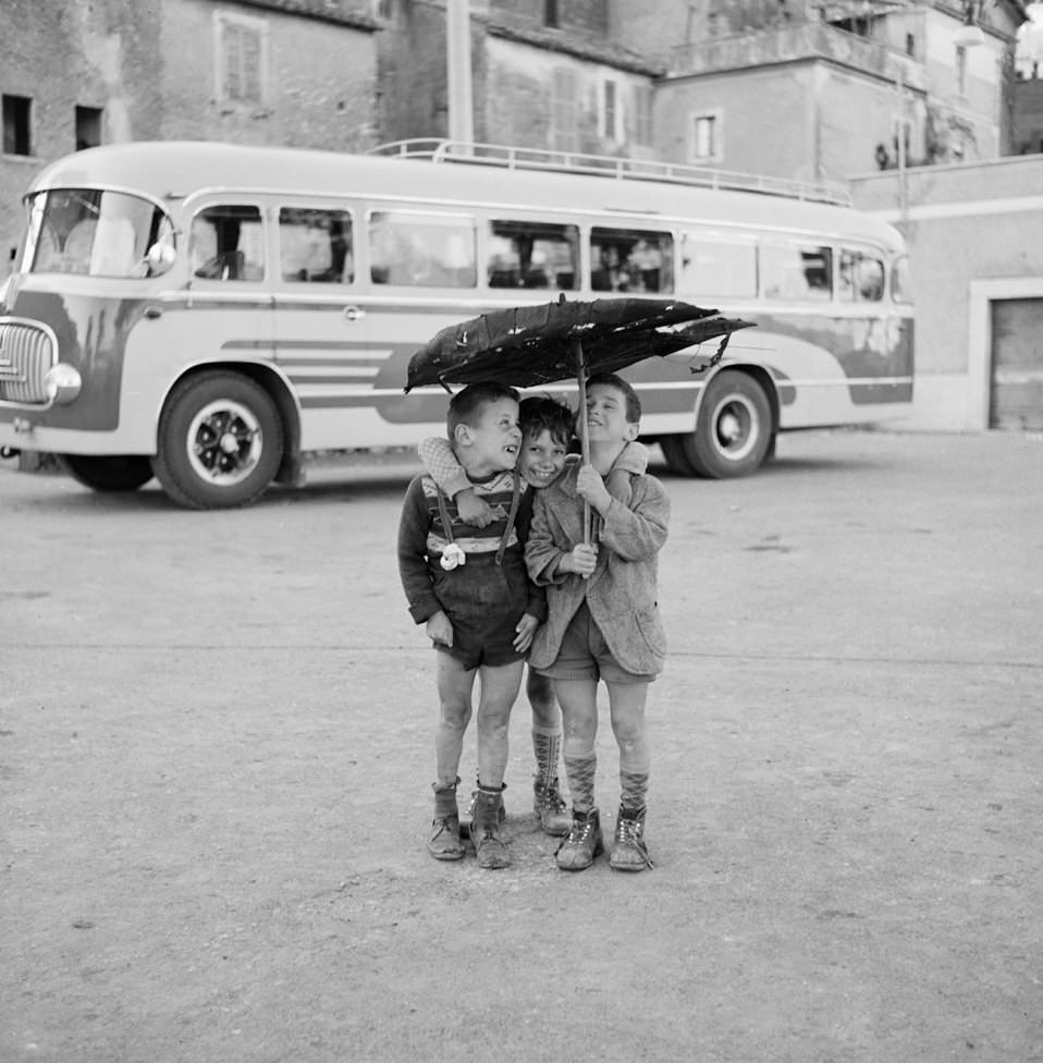 Three Boys Under an Umbrella, Rome, 1956