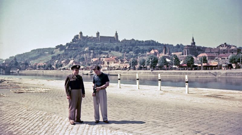 Leo and Max on the bank of the Main in Würzburg with the Marienberg in the background, Germany, 1950