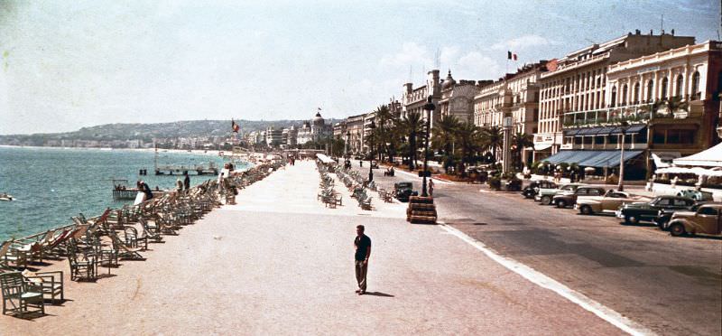 Max Leonard on the Promenade des Anglais in Nice. The hotel Negresco is at the far end, France, 1950
