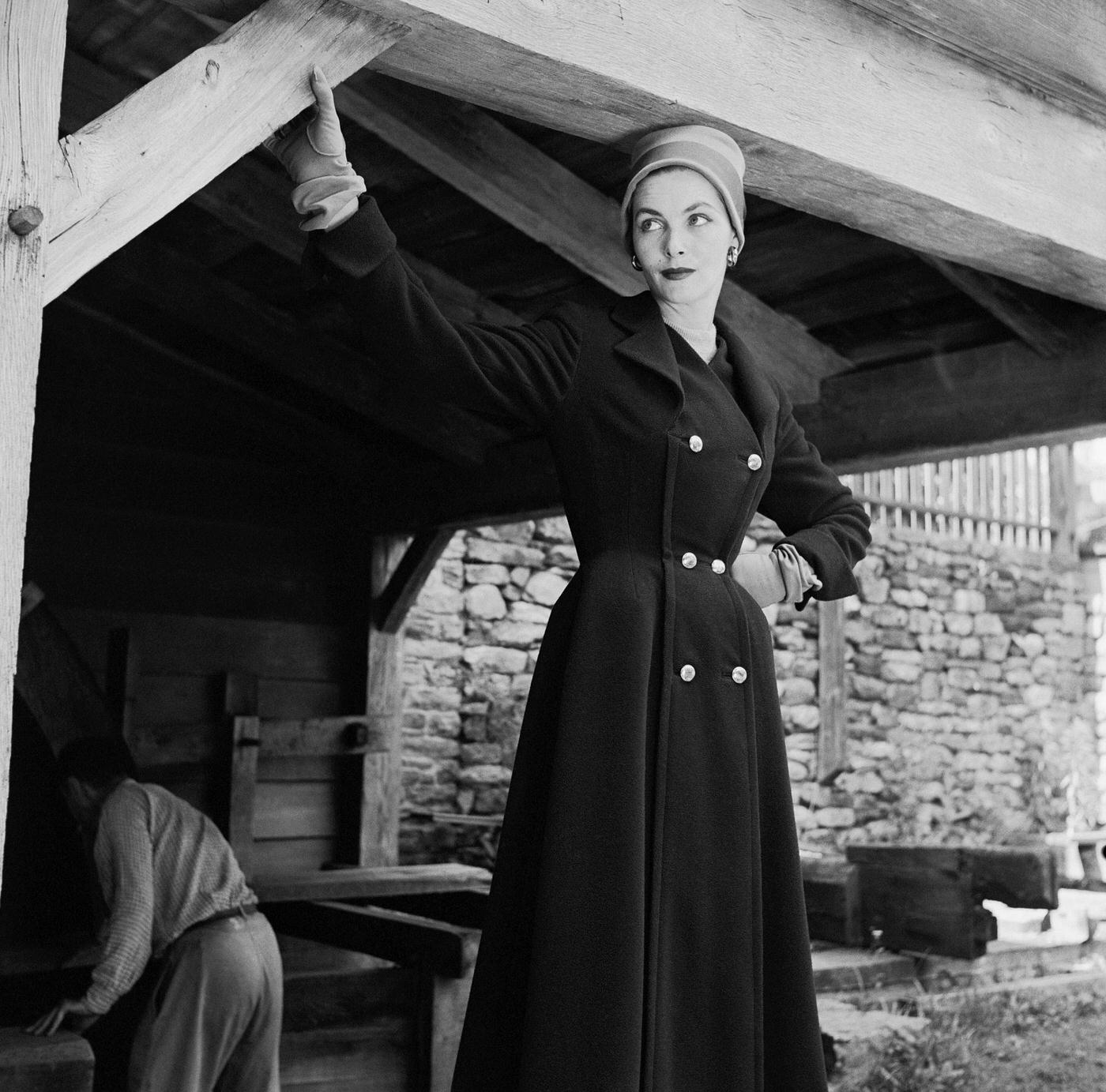 Georgia Hamilton models a wool coat suit by Seymore Fox in the barn at Philipes Manor Hall.