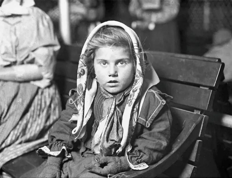 Italian child dinds her first penny, 1926.