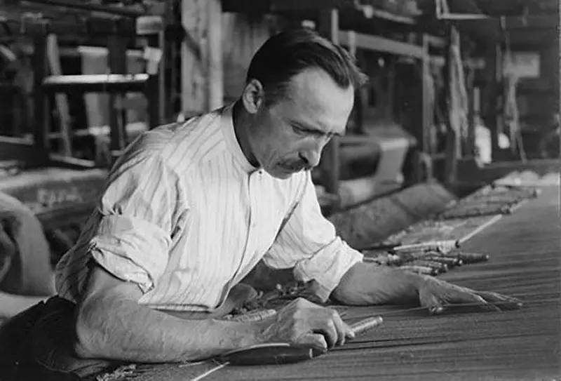 French worker making high-grade tapestries, New York City, 1920.