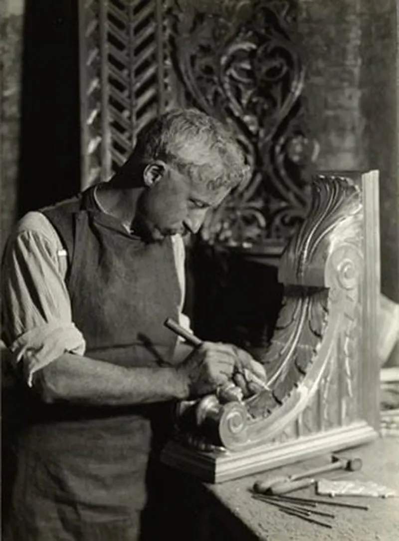 Italian craftsman working in bronze, New York City, 1930.