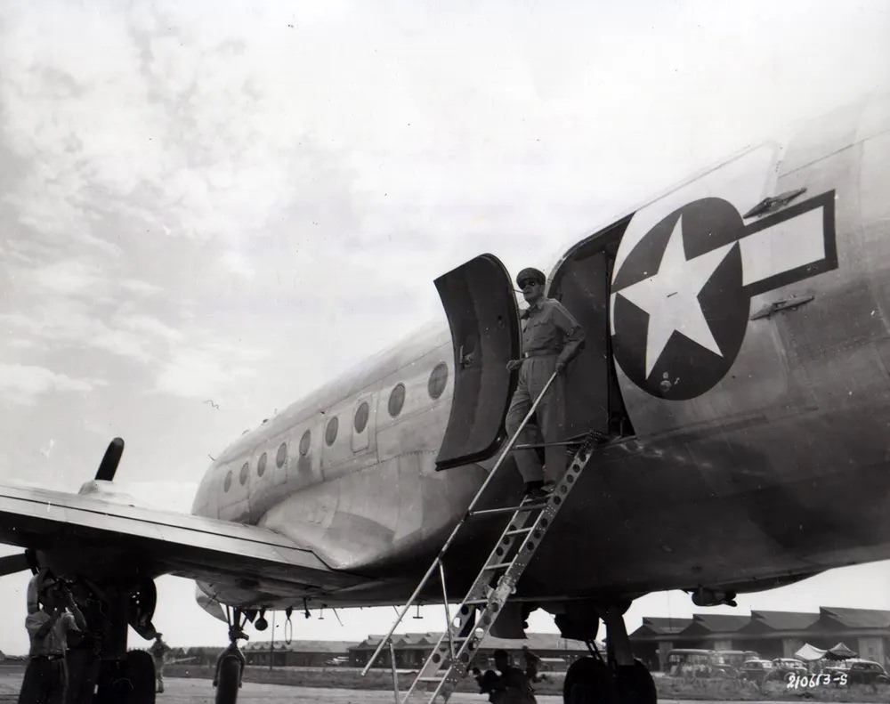 General Macarthur arrives on a C-47 to take over as Overlord of Japan.