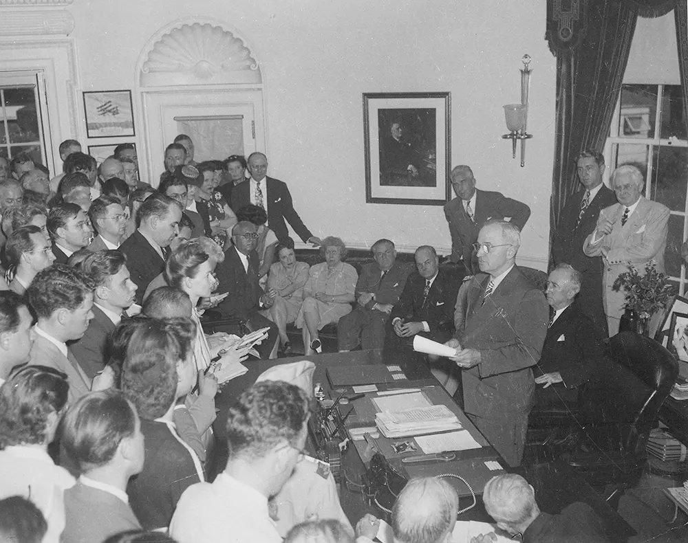 Harry Truman announcing Japan’s surrender at the White House, Washington, DC, 14 Aug 1945.
