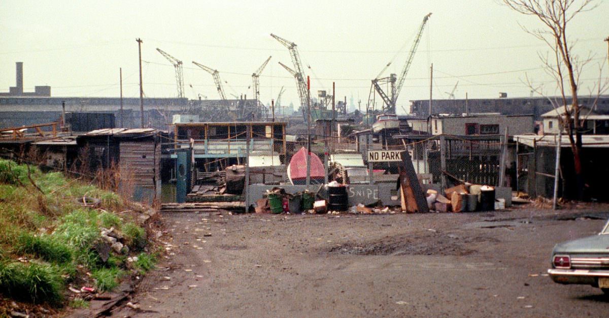 The abject no-man’s land at the end of Greene Street looking south to the Morris Canal, The Statue of Liberty and Ellis Island.