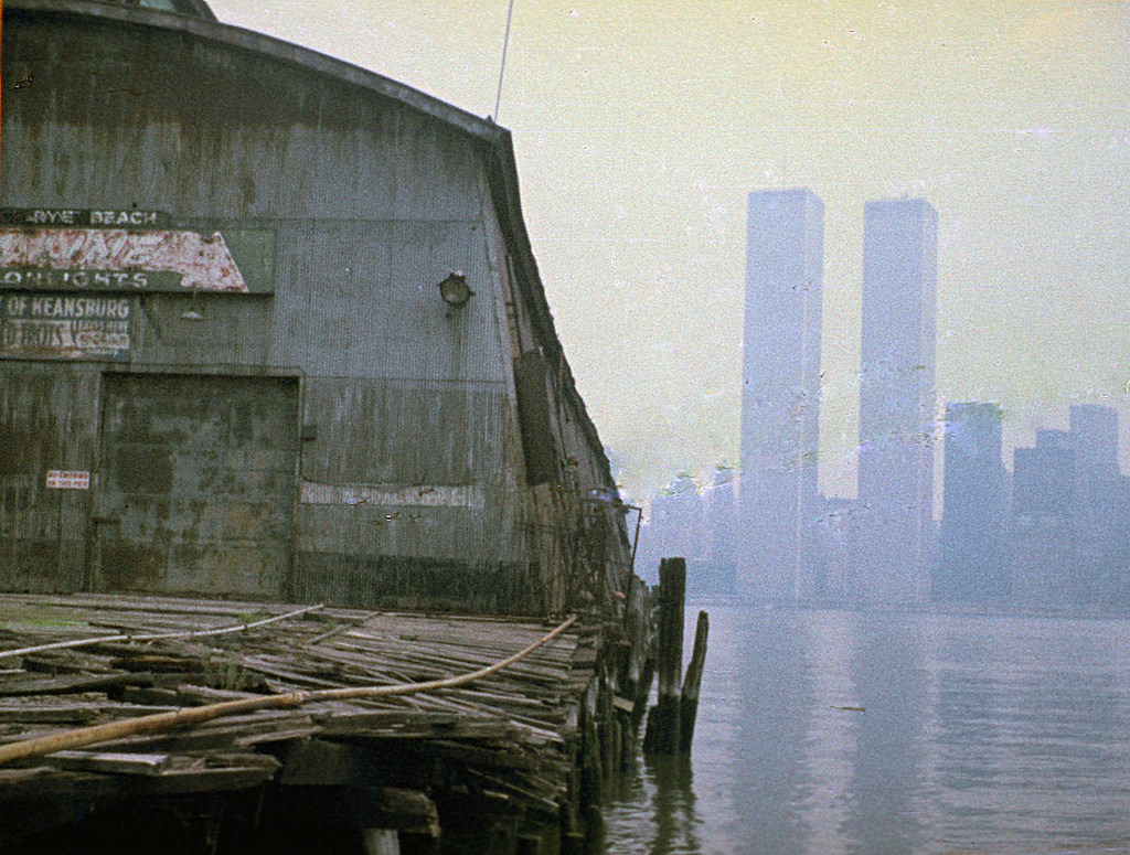 Abandoned pier at Exchange Place in Jersey City with World Trade Center across the Hudson, March 1975
