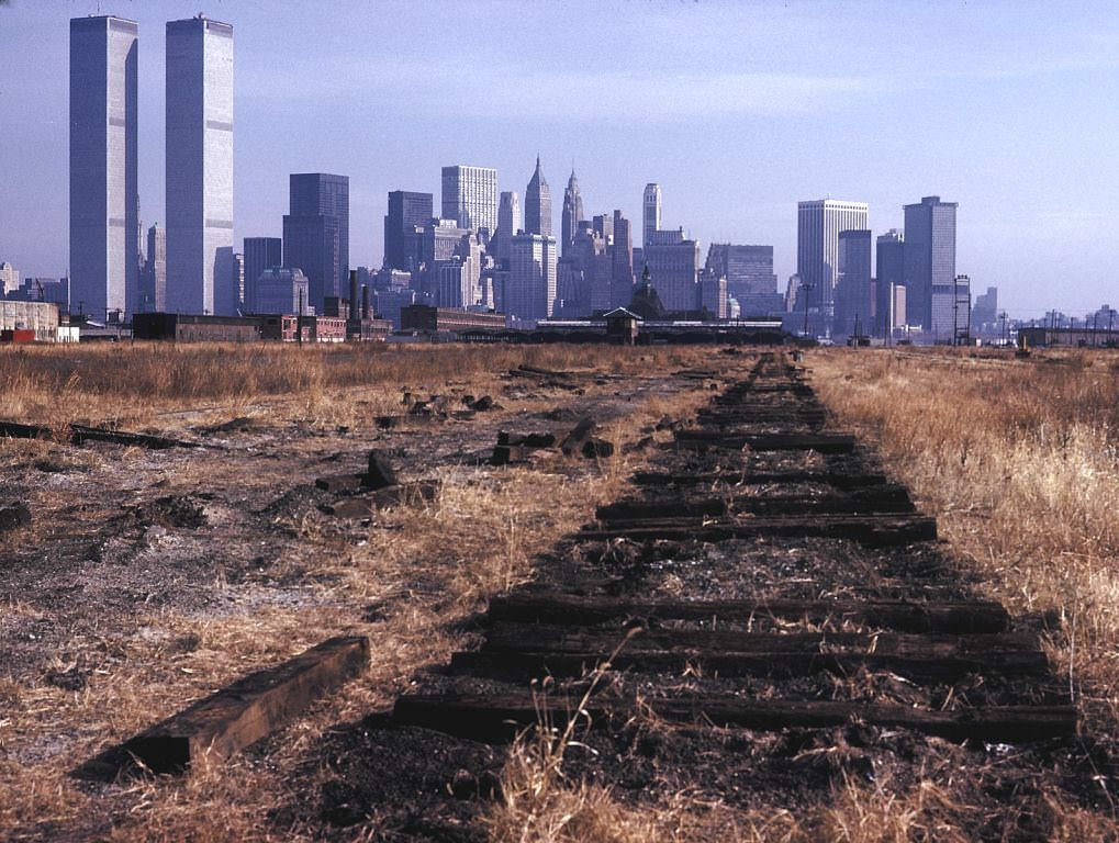 World Trade Center, Lower Manhattan, abandoned Central Railroad of NJ Terminal and railroad land(Liberty State Park is here now), Jersey City, 1975