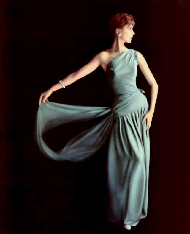 Marie-Hélène Arnaud in one-shoulder crêpe de chatillon evening gown by Grès, 1955