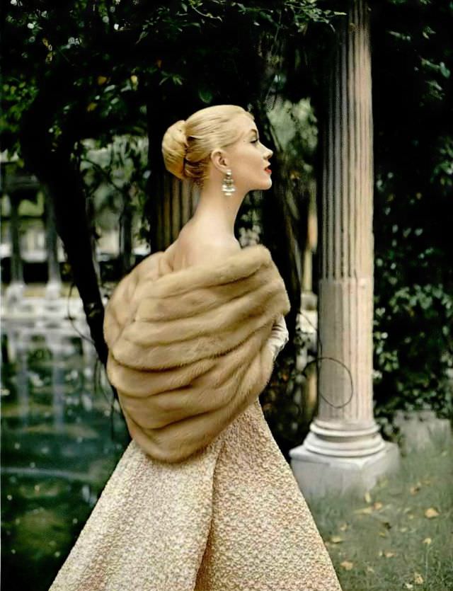 Model in Desert Gold EMBA mink stole by Max Reby, gold matelasse gown by Grès, 1957