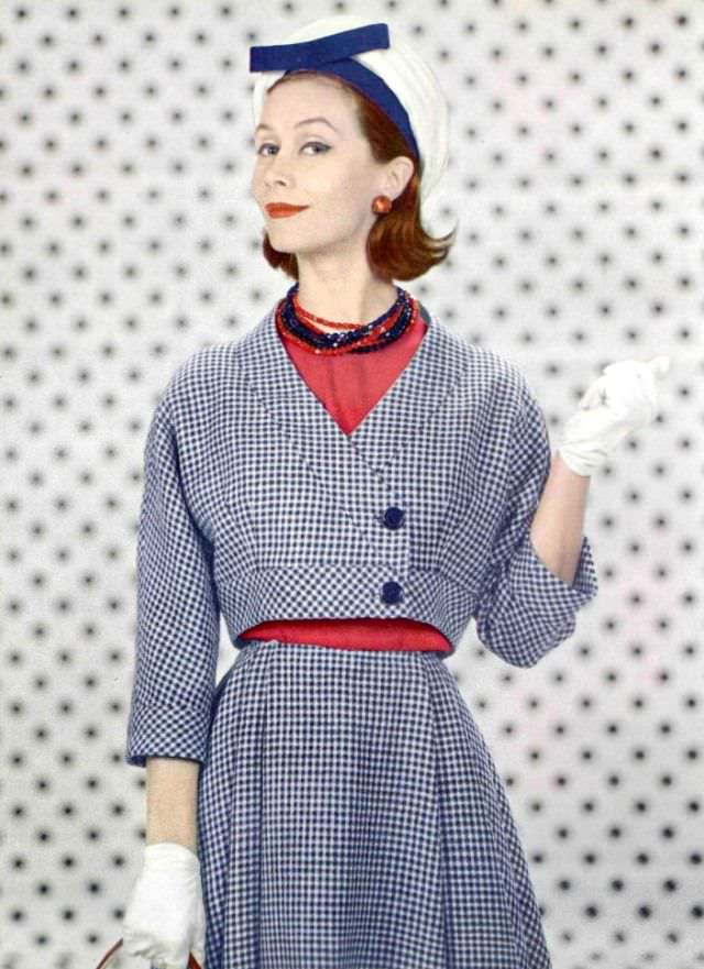 Gigi Terwalgne in blue and white wool houndstooth, short collarless bolero worn over red silk blouse by Grès, hat by Jane Blanchot, 1959