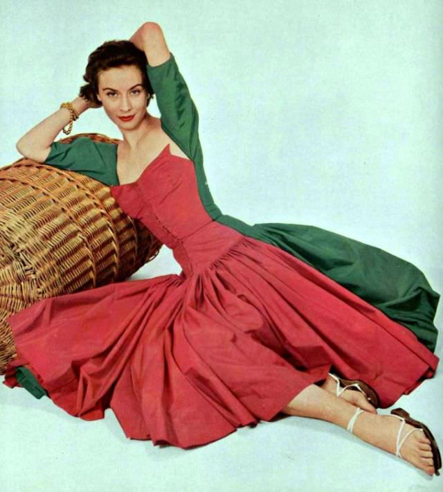 Gigi Terwalgne in a fun summer dress of two opposing colors by Grès, 1952