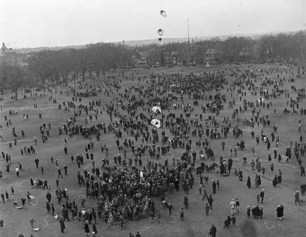 A man-kite is demonstrated for a crowd at Dexter Field in Providence, Rhode Island.