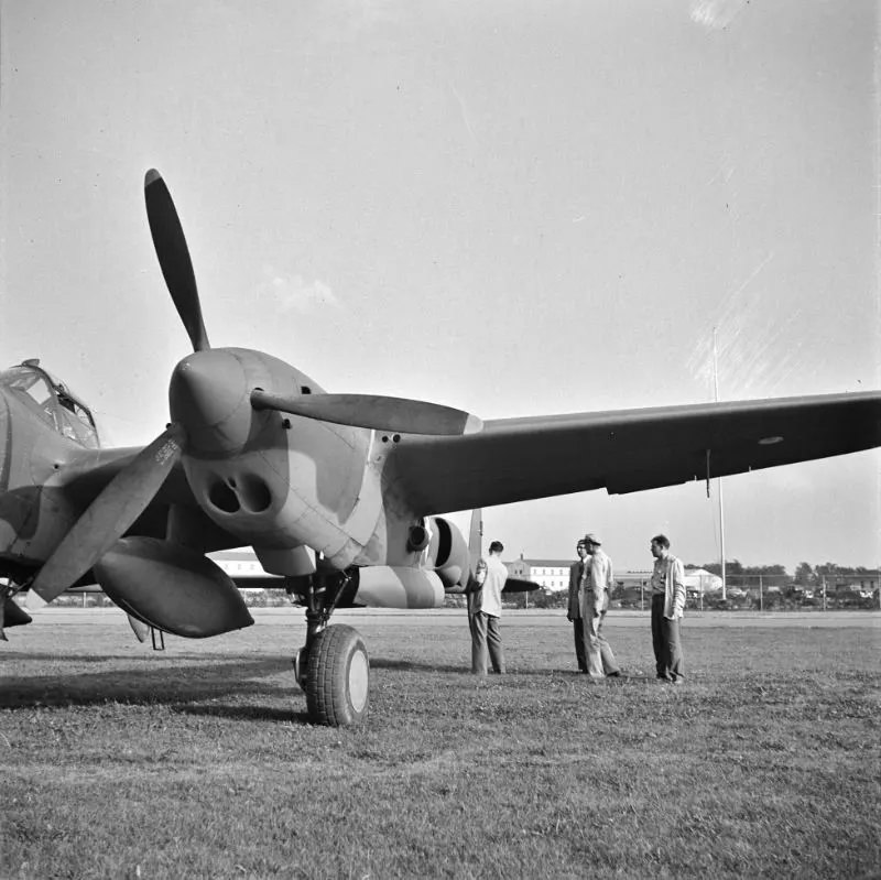 A United States Army Air Corps air ferry command base sixteen miles from Detroit, Michigan at Wayne County Airport. Factory inspector and Captain Roddy inspect a new P-38, in September 1942.