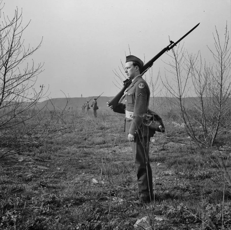 Army sentries guarding against a riot at the Sojourner Truth federal war workers housing project, caused by white neighbors’ attempt to prevent African-American tenants from moving in, February 1942.