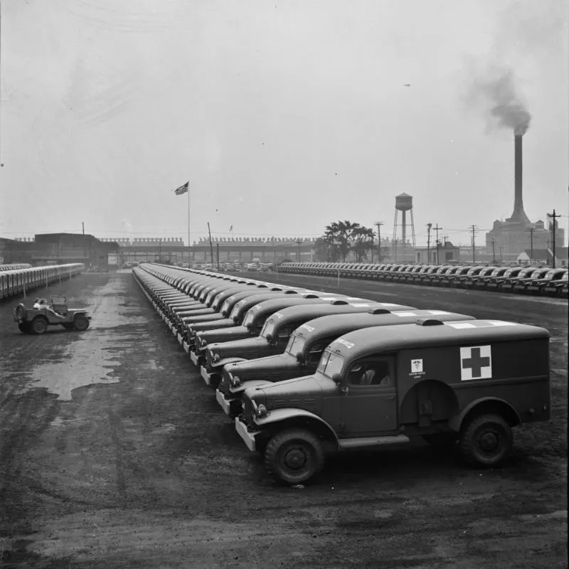 Chrysler Corporation Dodge truck plant. Dodge Army ambulances are here, lined up for delivery to the Army, Detroit, Michigan, August 1942