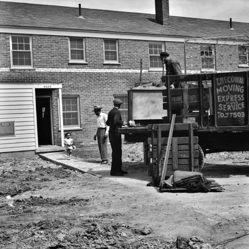 First Black family moving into the Sojourner Truth neighborhood, Detroit, Michigan, 1942.