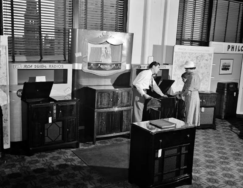 Buying a radio in the Crowley-Milner department store, Detroit, Michigan, July 1941.