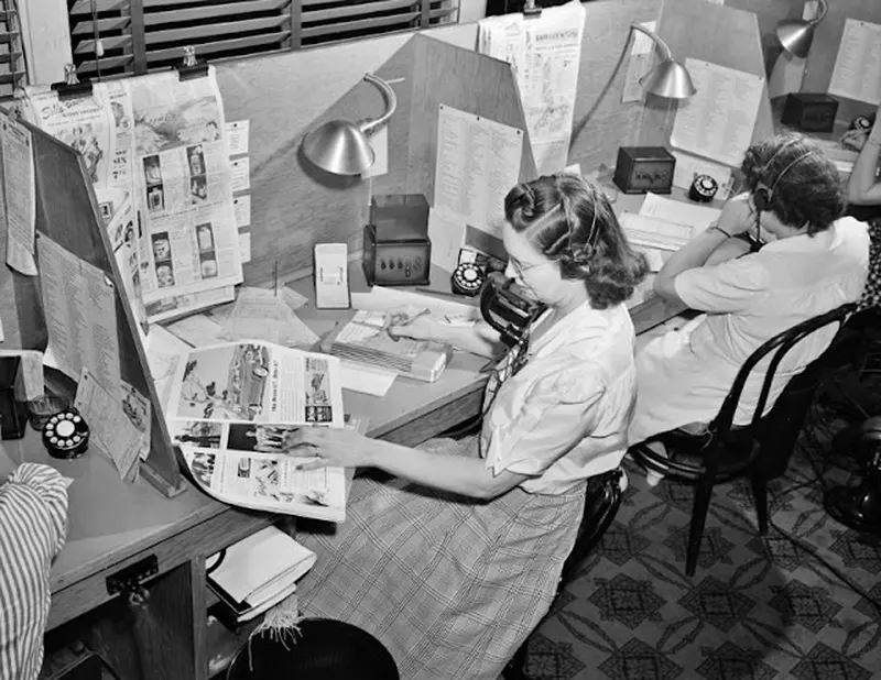 Operator taking telephone orders at the Crowley-Milner department store, Detroit, Michigan, July 1941.