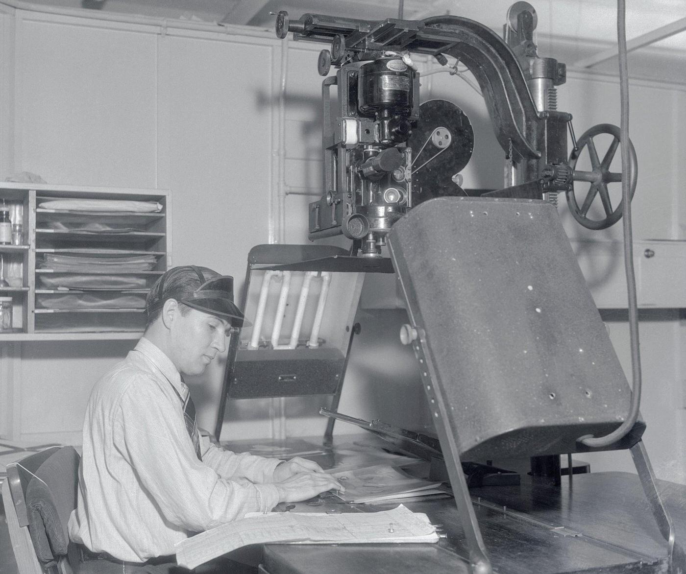 Worker photographing Animation for Disney Studios