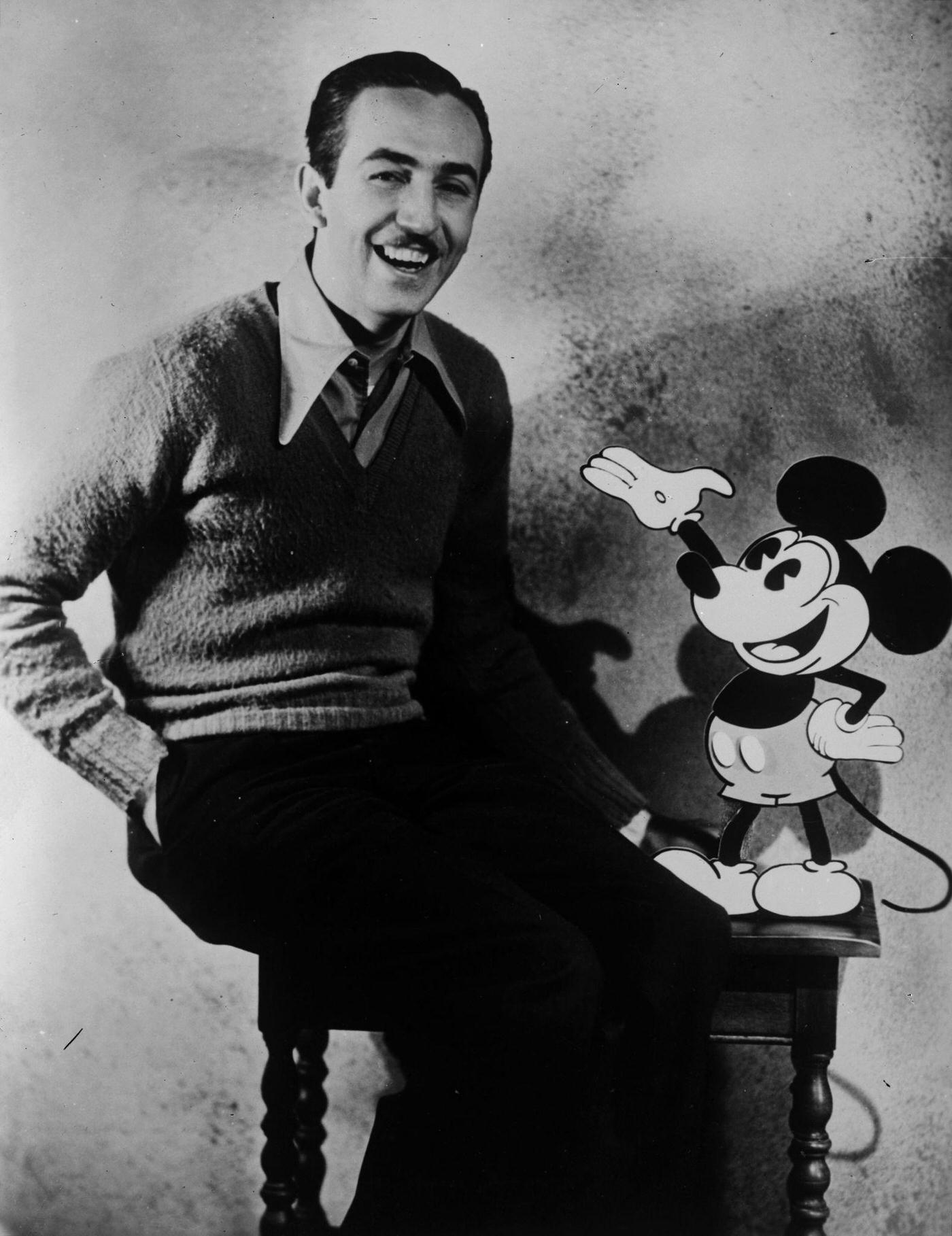 Walt Disney with Mickey Mouse.