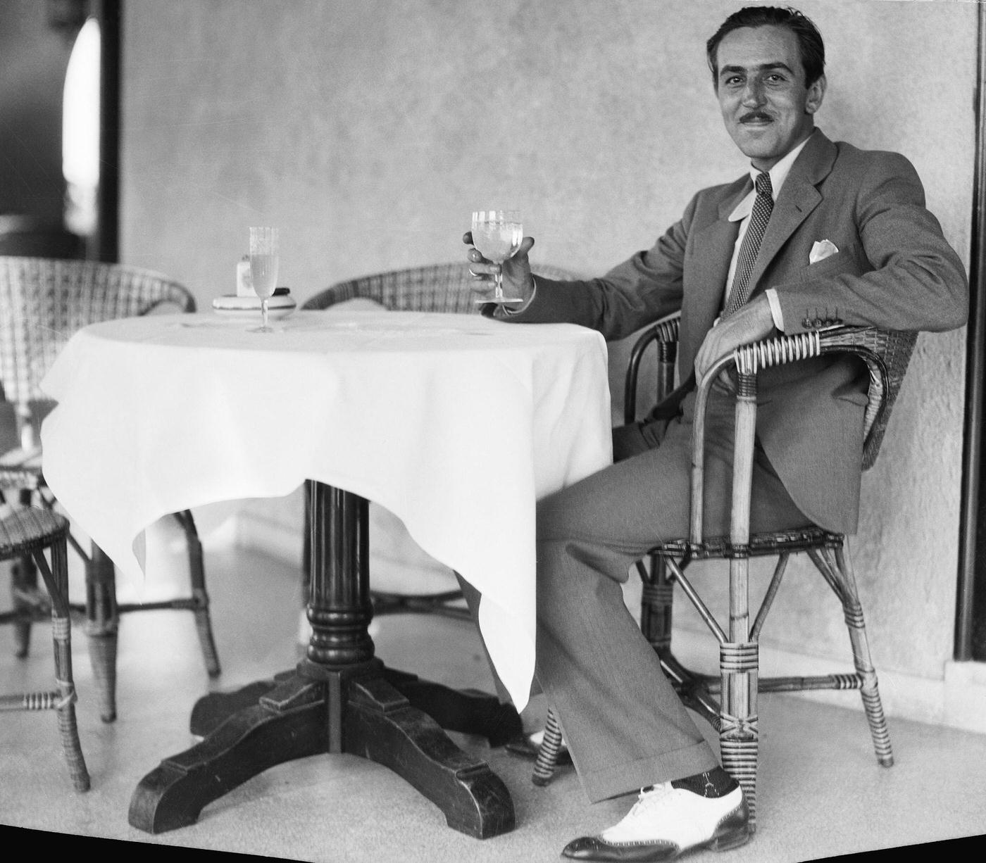 Walt Disney on the terrace of his hotel during a two-week holiday in Havana.