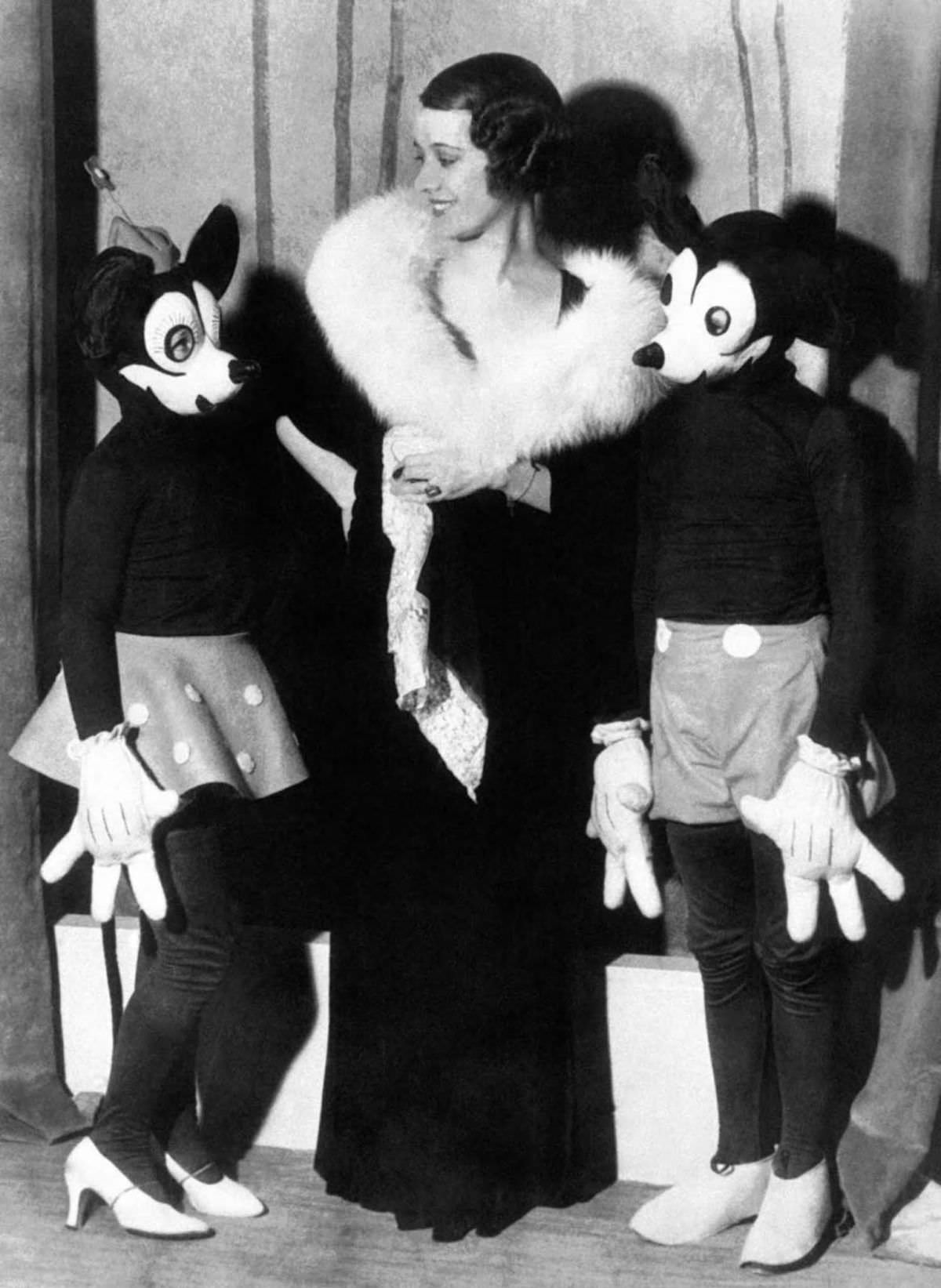 Lily Pons, singer at New York’s Metropolitan Opera with Mickey and Minnie, 1932.