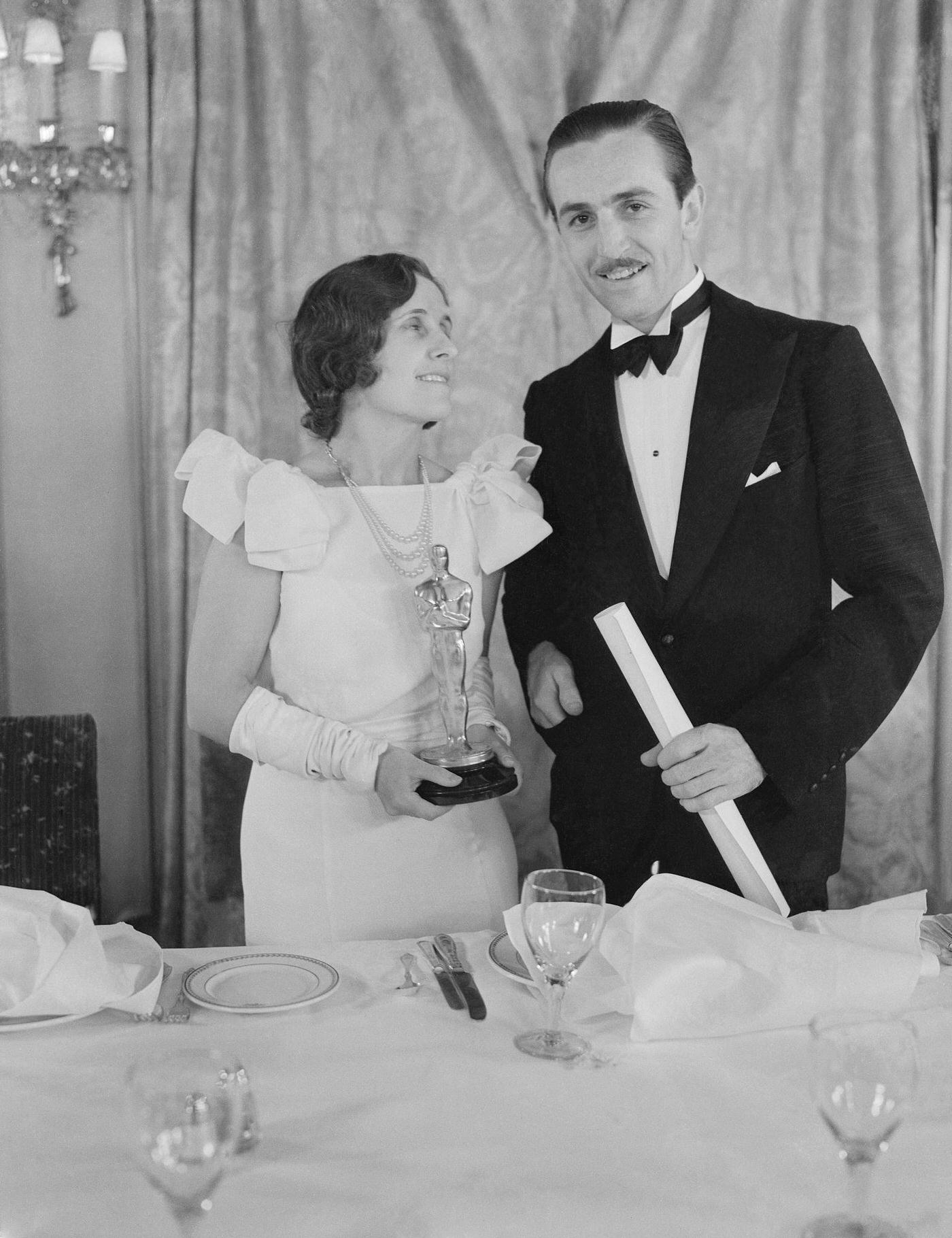 Walt Disney and Wife Holding Oscar